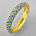 Enameled 14k gold hinged bangle embossed basket woven design with translucent blue and green enamel ca 1960  6 78 interior 269 dwt