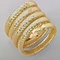 Sprung gold mesh serpent armlet loop coiled serpent with red gem eyes spring steel interior mid 20th c questionable italian marks for 18k gold 4 12 919 gs gw