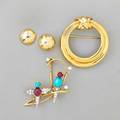 Tiffany  co and other 18k gold jewelry songbird brooch with ruby cabochons turquoise and diamonds indistinctly marked tiffany  co etoile diamond ball earrings tiffany  co wrapped circle b