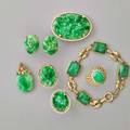 Jade or nephrite 14k gold jewelry eight pieces two pairs of pierced foliate carved earrings and matching brooch 1 58 link bracelet ca 1940 7 melon carved pendant with diamond oval jade and
