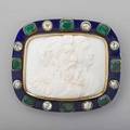 Large enameled jeweled conch cameo brooch cushionshaped cameo depicts roman noble and wife jugate bordered by eight rectangular emeralds and eight rose cut diamonds approx 2 cts tw on royal blue