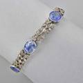 Late victorian sapphire and diamond bracelet six oval faceted blue sapphires approx 15 cts tw in millgrained bezels joined by leafy links set with rose cut diamonds silvertopped gold 6 12 1