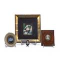 Victorian miniature paintings on ivory four 19th c framed three with women and one mourning portrait of a child with woven hair largest 3 12 x 4 12