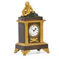 French bronze dresser clock porcelain dial surmounted by cherub 19th c 9 12 x 5 12 x 3 12