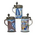 Delft steins three with figural or floral decoration pewter lids and bases 18th c tallest 9 12