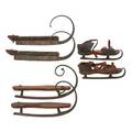 Handforged ice skates three pair in wood with leather bindings 19th c largest 7 x 13