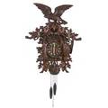 Black forest cuckoo clock elaborately carved game decoration surmounted by an eagle weight driven 19th c 30 x 28 x 12