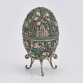 Russian enameled 84 silver eggshaped box vertically lobed and wirework banded shaded polychrome enameled cloisonne scrolling foliage applied silver depicts saint basils and christ the saviors ca