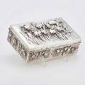 Chinese export silver cigarette box hinged cover and sides with embossed flowering iris plants and water above stippled ground ebonized wood interior luen wo shanghai 18751925 8 34 x 5 58 x
