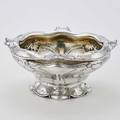 Gorham martele silver center bowl softly billowed form with undulating everted rim conforming pedestal foot decorated throughout with broad blossom and whiplash straps gilt interior ca 1900 typ