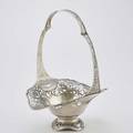 Gorham sterling art nouveau cake basket undulating bowl and fixed handle pierced and chased with stylized poppy blossoms ca 1900 1148l indistinct date mark 17 3327 ot
