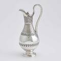 George iii sterling claret jug classical urn form raised and chased with grecian motifs flower finial on hinged lid benjamin smith london 1834 12 229 ot