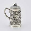 Hb stanwood  co coin silver tankard heavy cast tapered cylinder embossed with meandering grape vine on wood textured ground grape finial boston mid 19th c 7 14 299 ot
