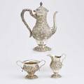 S kirk  son inc silver repousse mocha service three vessels with floral chasings includes coffee pot 9 12 over final cream jug 4 38 over spout sugar bowl 3 14 over handle 19251932 m