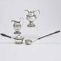 Philadelphia coin silver four pieces joseph anthony toddy ladle with turned wood handles 17891791 chaudrons  rasch cushionshaped cream pitcher with applied banding floral and acanthus 18091