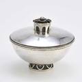 Silver covered bowl round spothammered above ring foot with applied crescents concentric triplerow finial with pierced arches midlate 20th c unmarked 5 x 4 14 124 ot