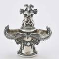 Figural 800 silver double salt cellar designed as tapered column surmounted by two mermen above fishshaped bowls and sea life festoon coppini florence 1911 inscribed under base 1886 c 1911 5 