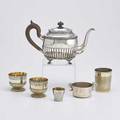 Continental silver holloware six pieces silver teapot wood handles grnvall stockholm 1827 11 across handle 6 34 above handle two halfreeded cups with gilt interior three cups possibly g