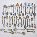 Thirtynine silver souvenir spoons enameled spoons includes ships indians yacht flags oranges shields cast spoons include columbia exposition 1895 figures on horseback etc most american 189