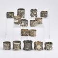 Fifteen floral motif silver napkin rings japanesque and art nouveau motifs makers include gorham whiting chinese stieff unger brothers towle gorham kerr 19th20th c 19 ot
