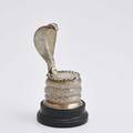 Silver cobra form inkwell inscribed 1869 coiled hooded cobra with ruby eyes on round onyx base glass interior hinged lid inscribed happy birthday oct 7 1869 7 14 12 ot weighable silver