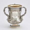 Gorham sterling loving cup of civil war interest flared body raised with cattails and water lilies three dolphin handles reeded base and acanthus foot spaulding  co 1894 possible association to