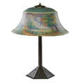 Handel reversepainted table lamp attr scenic landscape glass shade on patinated bronze base early 20th c base signed handel 22 x 17