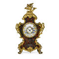 Louis xv style tortoise mantel clock ormolu mounted with gilt bronze boulle work porcelain numerals and original key and pendulum retailed by theodore b starr new york ca 1900 24