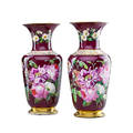 Pair of paris porcelain vases handpainted floral sprays on cranberry ground with foliate border and gilt trim 19th c 18