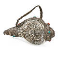 Tibetan silver mounted conch trumpet carved cloud and deity design with turquoise and coral inserts late 19th c length 8