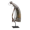 Tibetan silver mounted powder horn sinotibetan carved ceremonial design with woven polychrome strap on stand early 20th c 20 without stand