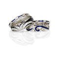 Four recent 18k white gold diamond enamel rings scroll motif dark blue enameled ring with two associated linear enameled guards convex black enameled ring diamond set fan design melee approx 35