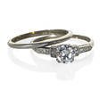 Diamond platinum engagement ring and band transitional cut diamond approx 75 ct tw by formula with single cut diamond shoulders approx12 ct tw inscribed on interior 22435 wedding band