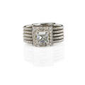 Princess cut diamond and 18k white gold ring diamond approx 73 ct by formula prong set within diamond frame melee approx 20 ct tw on band of five joined spring wires marked 18k 750 0016