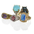 Collection of recent gemset gold rings five pieces carved blue glass intaglio 14k yg faceted amethyst horizontally set in substantial 14k yg mount with bezel set green and yellow quartz surround
