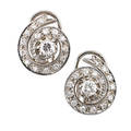 Platinum diamond ear clips single cut diamond swirls center rbc diamonds approx 25 ct each approx 125 cts tw throughout clip backs for unpierced ears ca 1955 unmarked 55 dwt