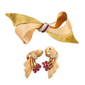Retro ruby diamond and gold brooch and earrings yellow and rose gold stylized bow brooch diamond and ruby knot odeonesque rose gold ruby and diamond earrings clip backs for unpierced ears diamond
