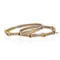 Charriol gemset 18k gold and steel bangles hinged bracelets set with faceted blue and yellow sapphires or rubies suspend signature charm ca 2005 accommodate 6 12 284 dwt gw