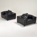 Contemporary pair of lounge chairs 2000s enameled wood stitched leather unmarked 31 x 51 x 42