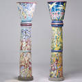 Studio two oversized columnar jardinieres glazed ceramic decorated in squeezebag and sgraffito cement bases unmarked taller 80 x 20 12 shorter 78 12 x 21