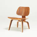Charles and ray eames herman miller lounge chair lcw chair zeeland mi 2010 santos palisander veneer metal tag 26 x 22 x 26