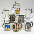 Mettlach steins etc eight pieces including mettlach 2093 deck of cards 12 l mettlach 2211 cameo 310 l steigel type pewter lidded enamel decorated glass stein etc most marked 19th20th