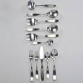 Lauffer seventy piece stainless steel flatware set in magnum pattern salad fork 13 soup spoon 14 dinner fork 13 butter knife 13 teaspoon 11 demi tasse 1 serving utensil 5 norw