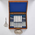 English and american sterling 24 piece sterling fish service by joseph rodgers sheffield 1890 carved oyster shell handles with armorial lion device engraved blades fitted case oval art nouveau