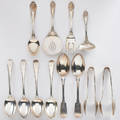 Sterling utensils includes tiffany  co twelve pieces two tiffany  co ice tongs 6 78 wallace sir christopher salad serving fork and spoon 8 12 ladle 6 12 and tomato lifter 8 14