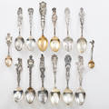 Sterling silver souvenir spoons group of fourteen earlymid 20th c nebraska colorado and spokane wa all marked longest 6 9 ot