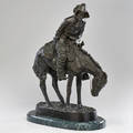 After frederic remington 18611909 patinated metal sculpture on marble base the norther 20th ct signed at base 22 12 x 17 14
