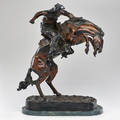 After frederic remington 18611909 bronze sculpture on marble base bronco buster 20th c signed at base marked 19200 21 14 x 14 12 x 8