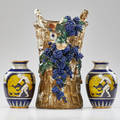 Amphora edda style vase with applied blackberries and pair of vases depicting daniel and the lion austria 1910s all marked tallest 15 12 x 10