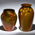 Helen m lyons rookwood two vases in standard glaze lyons with holly berries and similar with clover cincinnati oh ca 1903 both with flame mark and artist cipher taller 7 x 3 12
